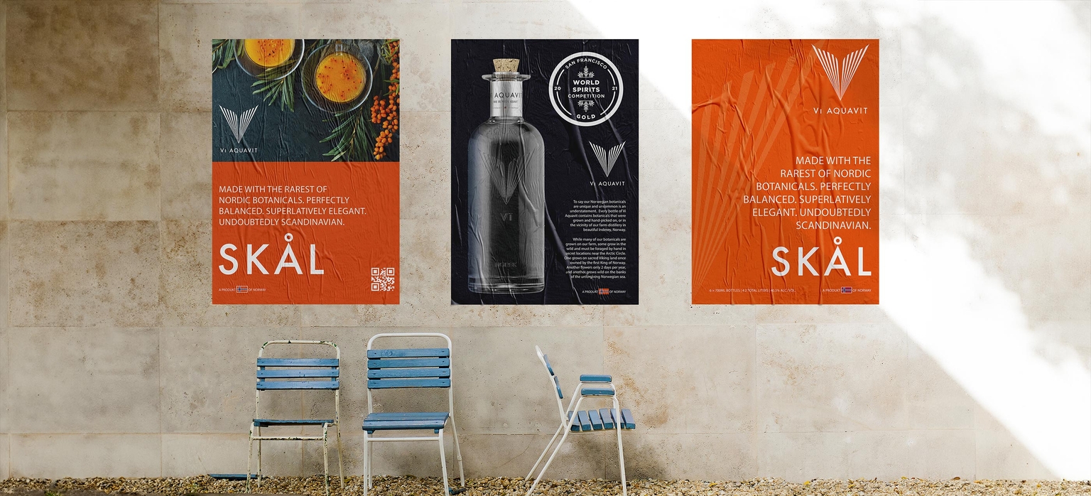 Mockup of Aquavit bottle posters on a wall.