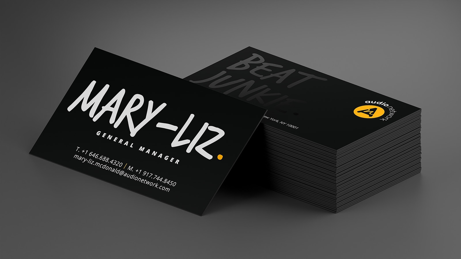 Rendering of Audio Network business card design.