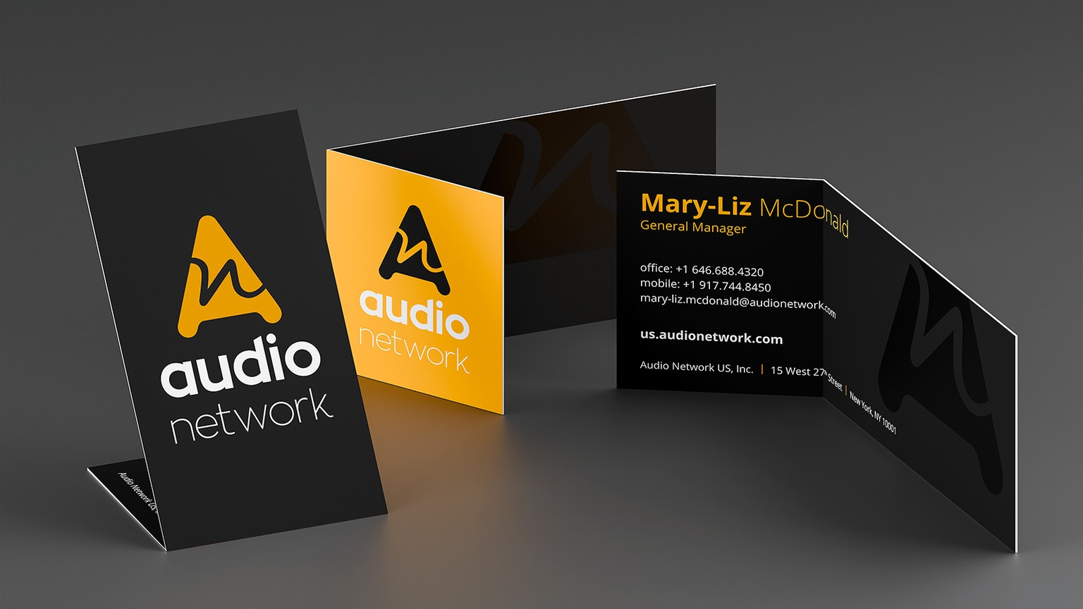 Rendering of Audio Network business card design.